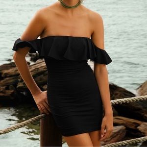 VIX Paula Hermanny off shoulder little black dress.